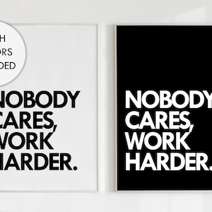 May include: Two framed prints with the text "Nobody cares, work harder." One print has a white background with black text, and the other has a black background with white text.
