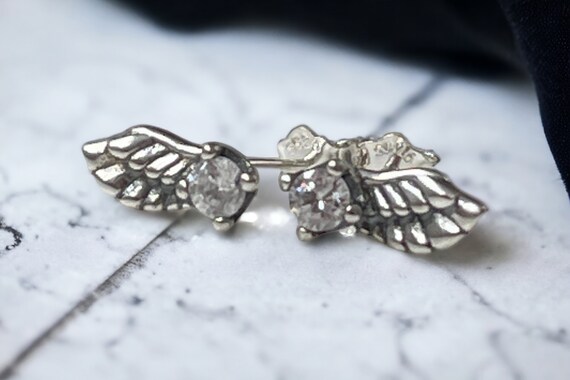 Pandora angel wing stud earrings discount