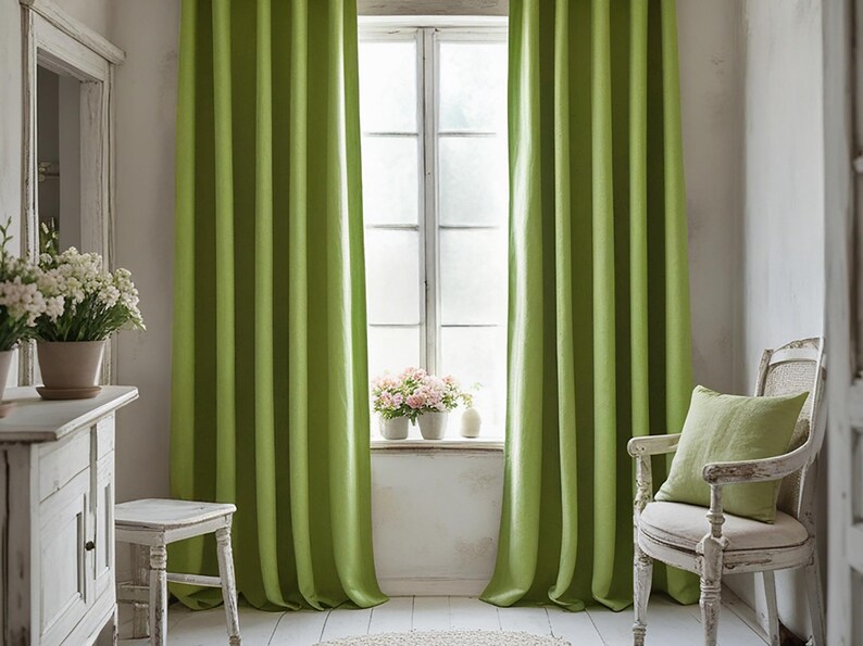 May include: Lime green striped curtains frame a window, with a white chair and a small table in the foreground. The curtains are the focal point, adding a vibrant touch to the room. A small white table and chair are in the foreground.