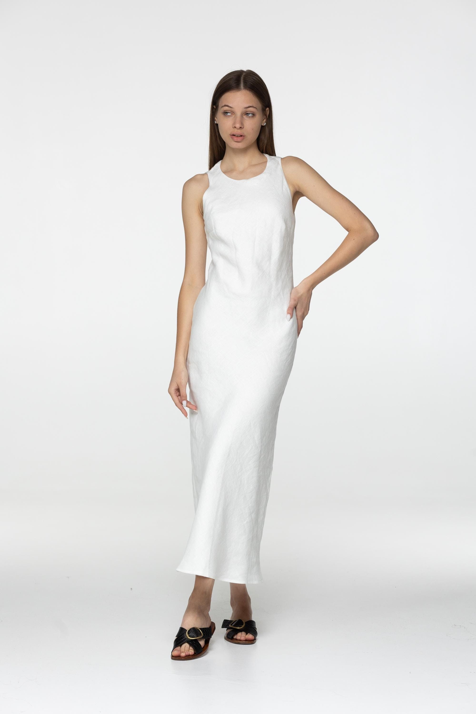 white camisole dress Modest Layering lined scoop front and low V back on a versatile Cotton/Lycra body with an attached same color circle skirt Modelyn White Camisole Dress, Delicate
