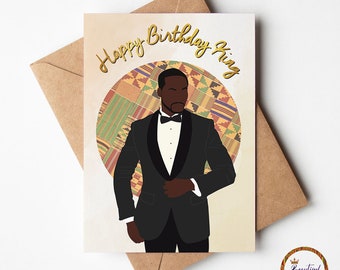 May include: A greeting card with the text "Happy Birthday King" in gold lettering. The card features a digital illustration of a Black man in a tuxedo standing in front of a circle of colorful African fabric.