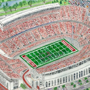 May include: An aerial watercolor illustration of a large horseshoe-shaped football stadium filled with spectators wearing red. The green field features the text OHIO STATE in one end zone and BUCKEYES in the other, with a signature in the corner.