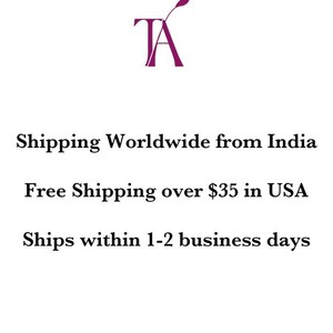 May include: A purple hummingbird logo with the letters "TA" below it. The text "Shipping Worldwide from India" is below the logo. The text "Free Shipping over $35 in USA" is below that. The text "Ships within 1-2 business days" is below that.