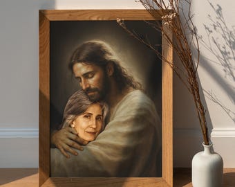 May include: A framed print featuring a tender embrace between Jesus and an older woman. The artwork is set in a wooden frame, with the figures depicted in soft, warm tones. A white vase with dried flowers sits nearby, adding a touch of natural decor.