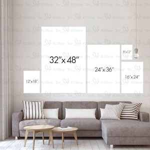 May include: A living room interior design mockup with a gray sectional sofa and two end tables. The wall behind the sofa is decorated with six different sized white frames with the dimensions of each frame written in black text. The frames are arranged in a staggered pattern.