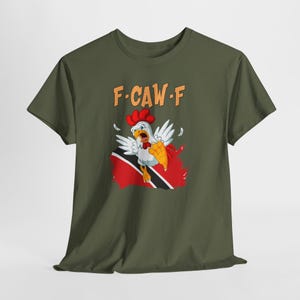 Model wearing Funny Trinidad T-Shirt outdoors, styled for everyday wear, humor gift for cricket fans in Trinidad. Trinbago Knight Rider CPL shirt. Funny Fuck off Shirt. Subliminal message for Guyanese fans