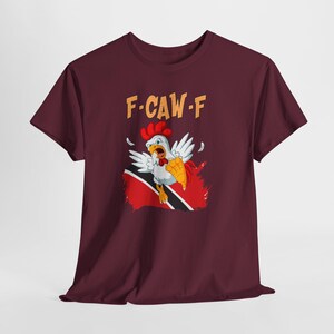 Model wearing Funny Trinidad T-Shirt outdoors, styled for everyday wear, humor gift for cricket fans in Trinidad. Trinbago Knight Rider CPL shirt. Funny Fuck off Shirt. Subliminal message for Guyanese fans