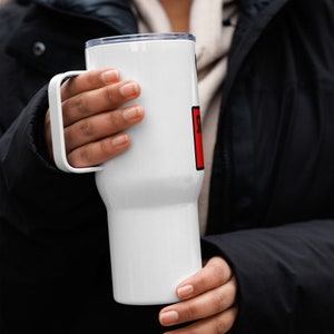 Travel mug with a handle