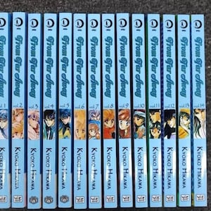 May include: A complete set of 14 manga volumes of "From Far Away" by Kyoko Hikawa. The volumes are blue with white text and illustrations of the characters.