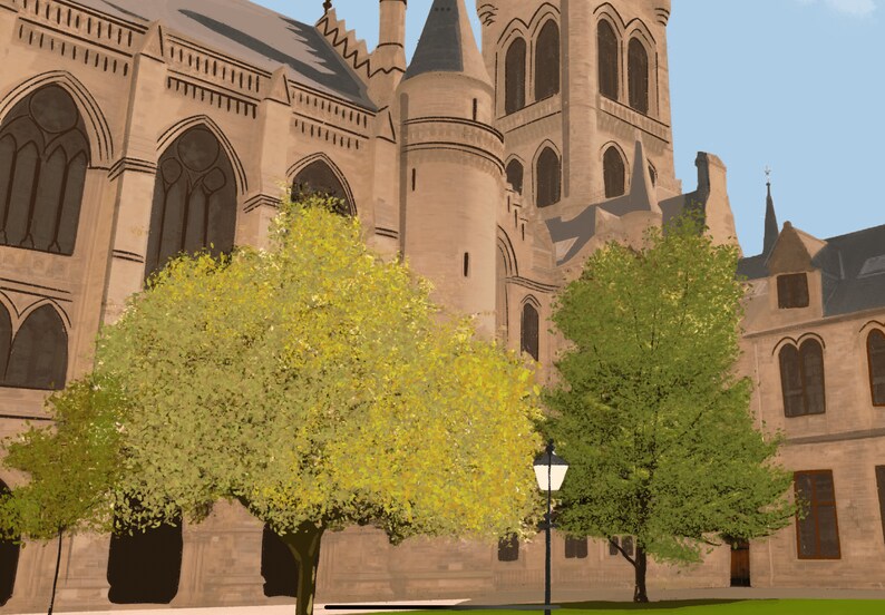 May include: A large, stone building with a tall tower and several windows. Two trees are in front of the building, one with green leaves and one with yellow leaves. A lamppost is in the foreground.