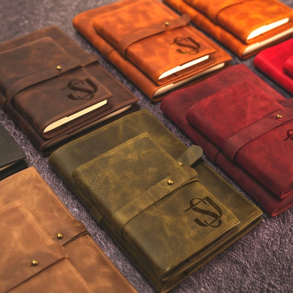 Hand-engraved leather journal cover that makes a sketchbook or notebook feel like a treasured artifact — the kind of thing people keep for decades.