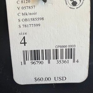 May include: White tag with black text, including product codes, size 4, and a barcode. The tag also includes the text "$60.00 USD".