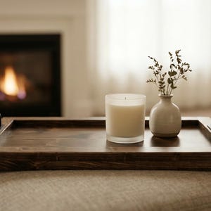 May include: A rustic wooden sign with the text "Welcome to our home" in white lettering. The sign features a distressed finish and a simple, inviting design, perfect for front door decor.