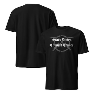 May include: Black t-shirts with the text "Stack Dimes Commit Crimes" in a stylized font. The design includes a gear and crossed tools. The shirts are short-sleeved and have a crew neck.