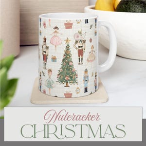 May include: White ceramic mug featuring a Nutcracker Christmas design. The mug is adorned with illustrations of nutcrackers, ballerinas, a Christmas tree, and other festive elements. The words "Nutcracker CHRISTMAS" are displayed at the bottom of the image.