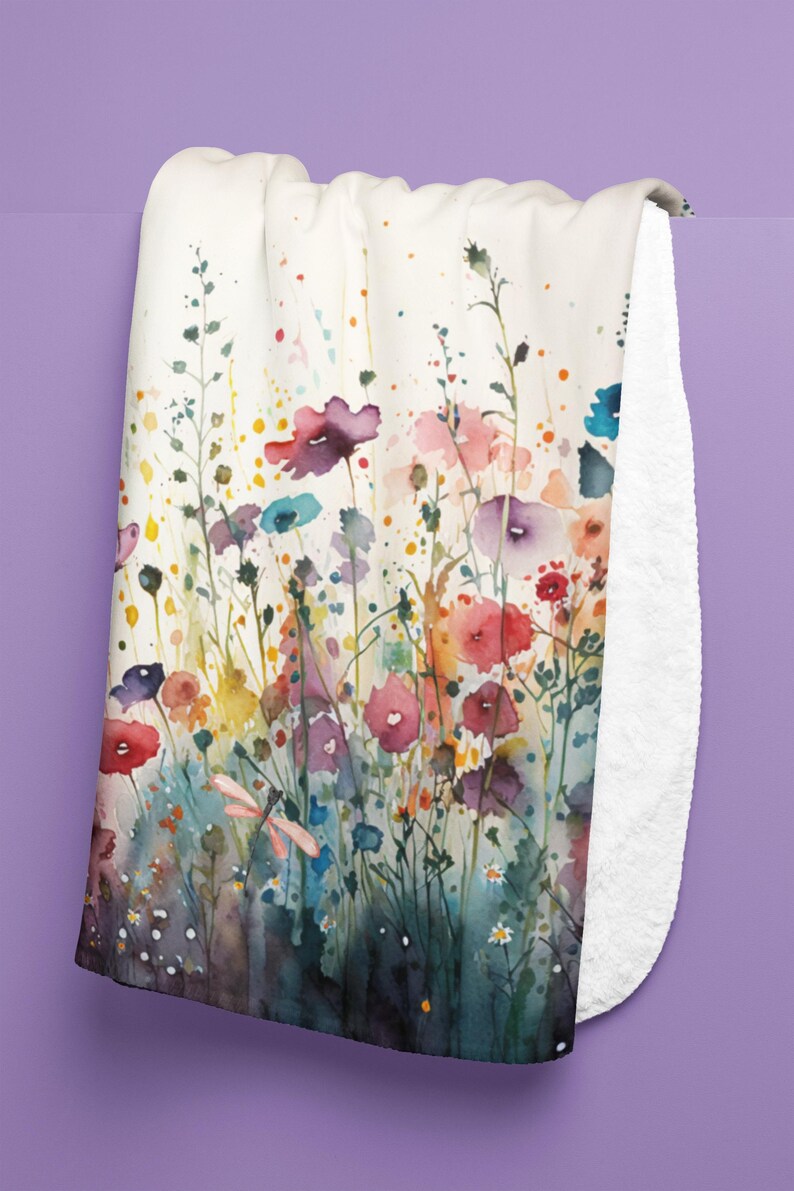 May include: A watercolor painting of a field of wildflowers in shades of pink, purple, red, yellow, and blue. The flowers are surrounded by green stems and leaves. A dragonfly is flying above the flowers.