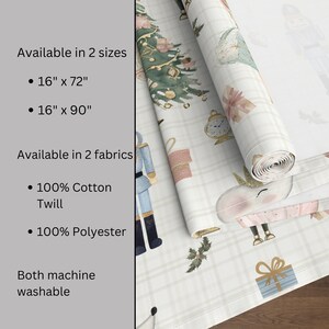 May include: A rolled-up Christmas-themed fabric with a whimsical design featuring a Christmas tree, nutcracker, unicorn, and gift boxes. The fabric is available in two sizes: 16" x 72" and 16" x 90", and two fabrics: 100% cotton twill and 100% polyester. The fabric is machine washable.