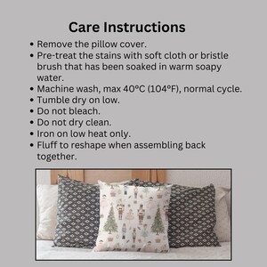 May include: Three decorative pillows with a Christmas theme. The center pillow features a festive print with nutcrackers, Christmas trees, and figures in pink and green. The other two pillows have a geometric pattern. The image also includes care instructions.