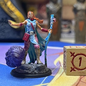 Female human Wizard, Sorceress, Cleric, Druid