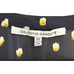 May include: A white tag with black text that reads "Collective Concepts" and "3X Made in China" on a black fabric with a white and yellow polka dot pattern.