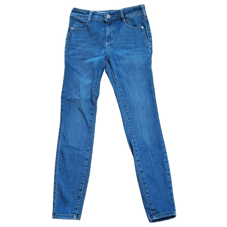May include: A pair of blue denim jeans with a slim fit.