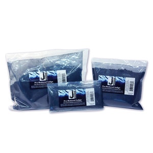 May include: Three bags of pre-reduced indigo dye powder, for use in making an indigo vat. The bags are labeled "Jacquard Pre-Reduced Indigo".