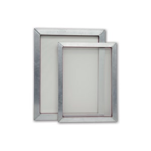 May include: Two silver-colored aluminum screen printing frames, one nested inside the other. The frames are empty and ready for use.
