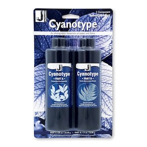 May include: A two-component cyanotype sensitizer set for photographic blueprints on paper and fabric. The set includes two black bottles labeled "Cyanotype" with Part A and Part B. The packaging features a blue leaf design and product information.
