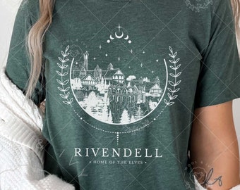 May include: A green t-shirt with a white graphic of a city with a crescent moon and stars. The text "Rivendell - Home of the Elves" is below the graphic.