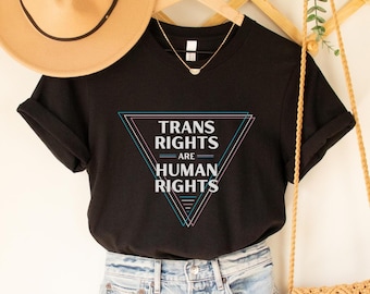 Koszulka „Prawa osób transseksualnych to prawa człowieka”, koszulka „Prawa osób homoseksualnych”, koszulka „Szanuj osoby transseksualne”, koszulka „Prawa człowieka”, koszulka „Równość”, koszulki LGBTQ+, koszulka „Duma”