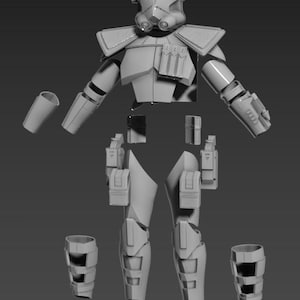 May include: A light grey, futuristic soldier's armour set, shown disassembled. The set includes a helmet, shoulder pads, chest armour, arm and leg pieces, and various accessories. The armour appears to be made of a hard, durable material.