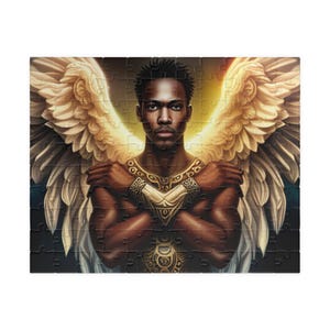 May include: A jigsaw puzzle featuring a portrait of a Black person with large, feathered wings and ornate gold armbands and chest piece. The background has a golden glow, and the puzzle pieces are interlocked.