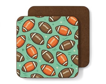 May include: Square coaster featuring a repeating pattern of brown and orange American footballs on a teal background. The coaster is made of a composite material and has a brown border.