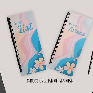 May include: Two spiral bound notebooks with colorful abstract designs. One notebook says "to do List" and the other says "Lista de Tareas". Choose English or Spanish.