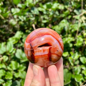 Colorful Carnelian Sphere with Druzy Cave - Polished