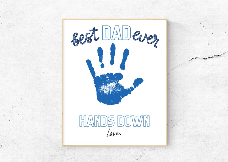 May include: A white printable sign with a blue handprint and the text "best DAD ever HANDS DOWN Love."