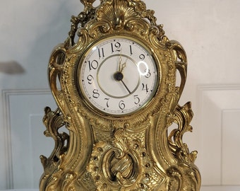 Vintage | Italian standing clock in gold bronze.