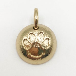 Vintage signed Mulberry gold tone paw print pendant