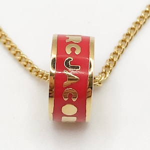 Vintage signed Marc by Marc Jacobs gold tone necklace with circle pendant red enamel - signature style statement piece