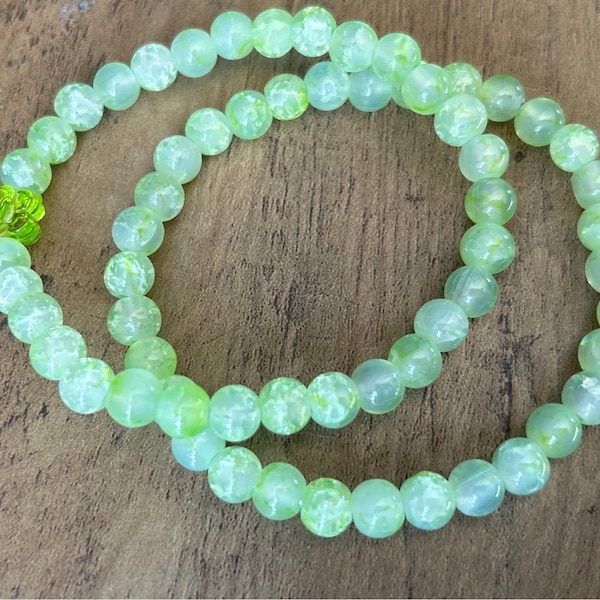 Pretty Handmade Green Flower Beaded Bracelet set, crackle beads, Slay, on trend, glass beads, funky, flower bracelets, daisy bracelets,gift