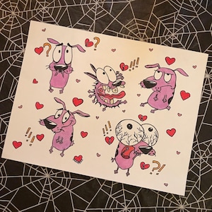 May include: A white paper with five illustrations of the cartoon dog Courage the Cowardly Dog in various emotional states. Each dog is pink with black spots and surrounded by red hearts and broken heart symbols.