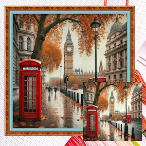 May include: Cross-stitch of a London street scene with a red telephone booth and Big Ben in the background. The scene is set in autumn, with orange leaves and a wet street. The image is framed with a brown border.