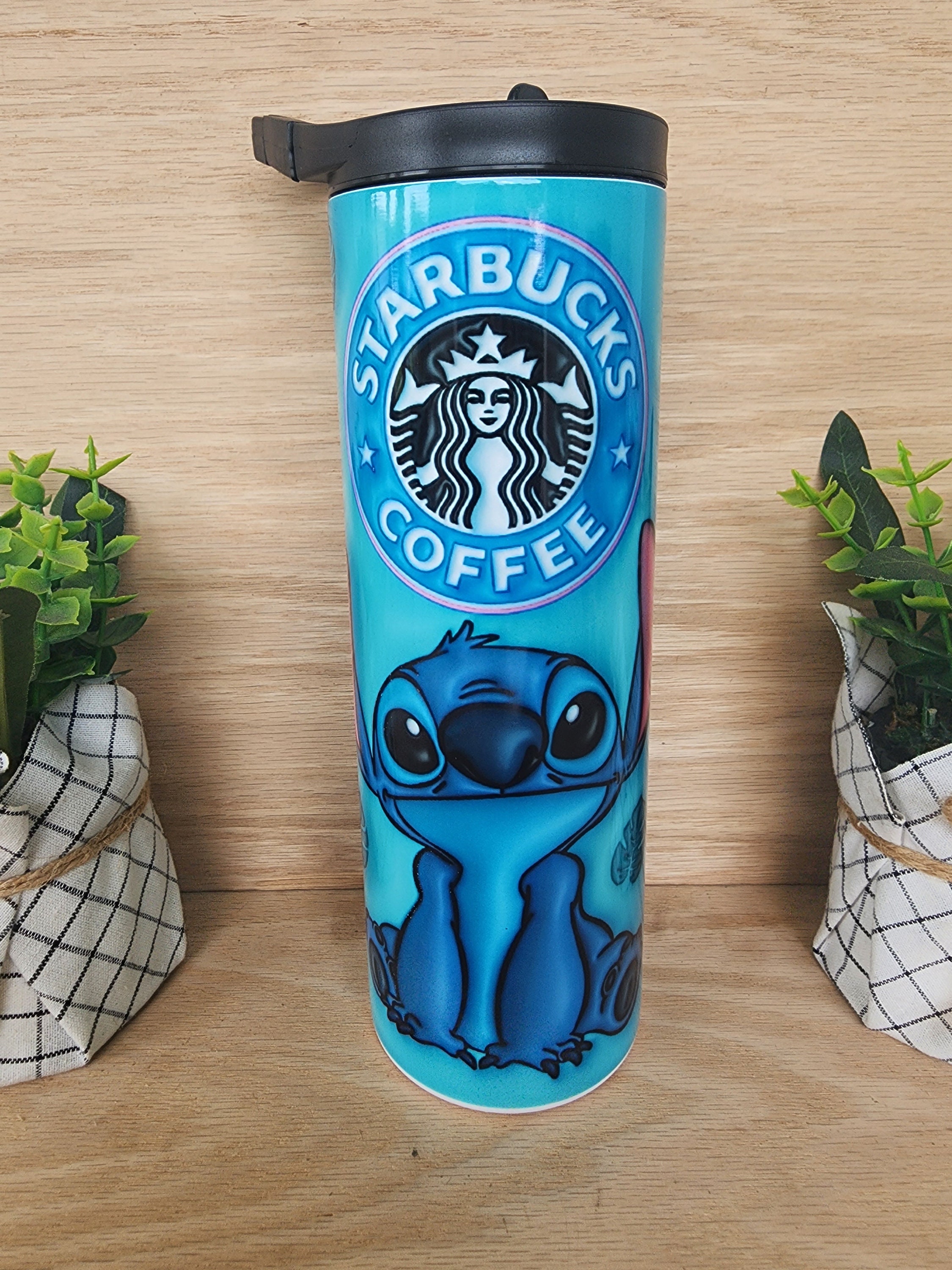 Tumbler/cup. Stitch from Lilo and Stitch cartoon. With coffee lettering and  leaves on a colorful background. 20oz skinny insulated tumbler.