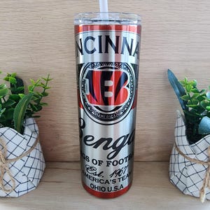 20oz skinny tumbler. Cincinnati Bengals beer can inspired design. With shiny iridescent coloring that resembles aluminum can/stained glass