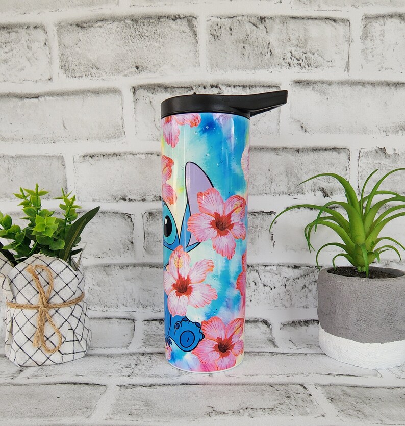Tumbler/cup. Stitch from Lilo and Stitch design. With hibiscus flowers and very colorful background. 20oz skinny tumbler. image 3