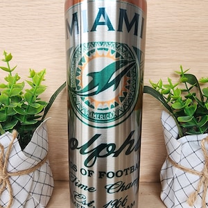 20oz skinny stainless steel tumbler. Miami Dolphins football team,  Florida inspired design. Aluminum can/beer look. Shiny iridescent design