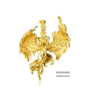 May include: A gold pendant featuring a detailed sculpture of an angel with outstretched wings. The pendant is a delicate and intricate piece of jewelry.