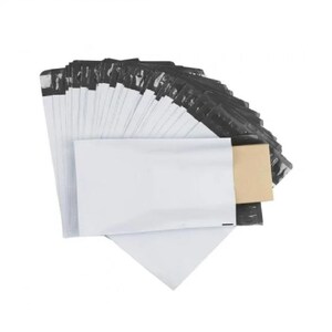 May include: A stack of white poly mailer envelopes with black sealed edges. A small brown cardboard box is visible among the envelopes. The envelopes are arranged in a fan shape, suggesting they are ready for use.