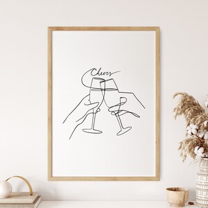 K&ouml;nnte beinhalten: Eine Schwarzwei&szlig;-Zeichnung von zwei Champagnergl&auml;sern, die aneinandersto&szlig;en. &Uuml;ber den Gl&auml;sern steht das Wort "Cheers".