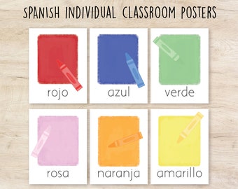 May include: Six colourful classroom posters in Spanish with the words "rojo", "azul", "verde", "rosa", "naranja", and "amarillo" printed on them. Each poster features a crayon in the corresponding colour.